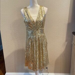 Shimmering Gold Mini Sundress with V-neck Sleeveless Design for Cocktail Events